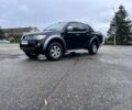 Чорний Міцубісі Л 200, об'ємом двигуна 2.5 л та пробігом 302 тис. км за 12500 $, фото 2 на Automoto.ua