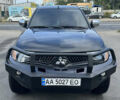 Черный Мицубиси Л 200, объемом двигателя 2.48 л и пробегом 210 тыс. км за 16500 $, фото 1 на Automoto.ua