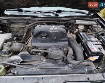 Чорний Міцубісі Л 200, об'ємом двигуна 2.48 л та пробігом 219 тис. км за 10500 $, фото 32 на Automoto.ua