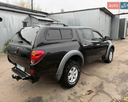 Чорний Міцубісі Л 200, об'ємом двигуна 2.5 л та пробігом 525 тис. км за 10000 $, фото 13 на Automoto.ua