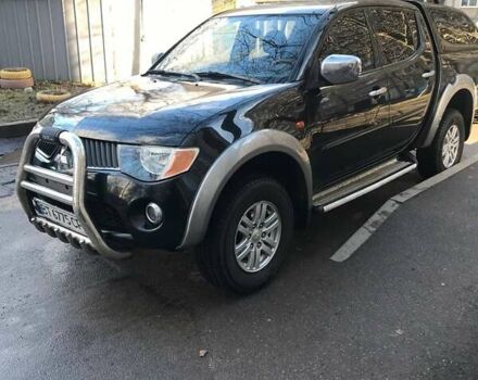 Черный Мицубиси Л 200, объемом двигателя 2.5 л и пробегом 270 тыс. км за 13000 $, фото 3 на Automoto.ua