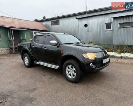 Черный Мицубиси Л 200, объемом двигателя 2.5 л и пробегом 261 тыс. км за 12300 $, фото 9 на Automoto.ua