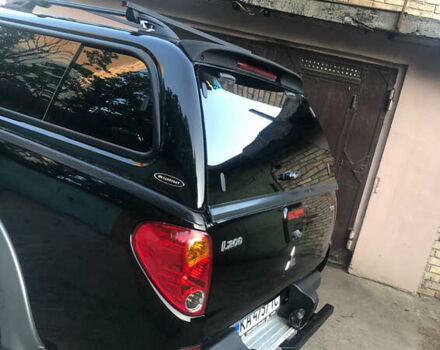 Чорний Міцубісі Л 200, об'ємом двигуна 2.48 л та пробігом 330 тис. км за 11800 $, фото 4 на Automoto.ua