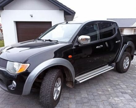 Черный Мицубиси Л 200, объемом двигателя 2.5 л и пробегом 270 тыс. км за 3424 $, фото 3 на Automoto.ua