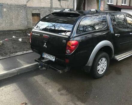 Черный Мицубиси Л 200, объемом двигателя 2.5 л и пробегом 270 тыс. км за 13000 $, фото 8 на Automoto.ua