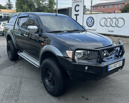 Черный Мицубиси Л 200, объемом двигателя 2.48 л и пробегом 210 тыс. км за 16500 $, фото 2 на Automoto.ua