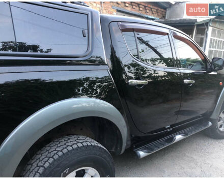 Чорний Міцубісі Л 200, об'ємом двигуна 2.48 л та пробігом 330 тис. км за 11800 $, фото 3 на Automoto.ua