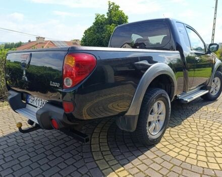 Черный Мицубиси Л 200, объемом двигателя 2.5 л и пробегом 230 тыс. км за 3150 $, фото 2 на Automoto.ua