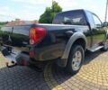 Черный Мицубиси Л 200, объемом двигателя 2.5 л и пробегом 230 тыс. км за 3150 $, фото 2 на Automoto.ua