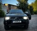 Чорний Міцубісі Л 200, об'ємом двигуна 0 л та пробігом 220 тис. км за 12800 $, фото 1 на Automoto.ua