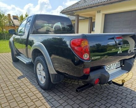 Черный Мицубиси Л 200, объемом двигателя 2.5 л и пробегом 230 тыс. км за 3150 $, фото 3 на Automoto.ua