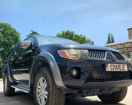 Черный Мицубиси Л 200, объемом двигателя 2.5 л и пробегом 221 тыс. км за 12800 $, фото 16 на Automoto.ua