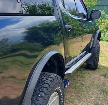 Черный Мицубиси Л 200, объемом двигателя 2.48 л и пробегом 392 тыс. км за 15500 $, фото 4 на Automoto.ua