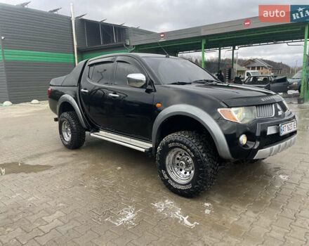 Черный Мицубиси Л 200, объемом двигателя 2.48 л и пробегом 370 тыс. км за 12750 $, фото 1 на Automoto.ua