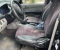 Черный Мицубиси Л 200, объемом двигателя 2.48 л и пробегом 376 тыс. км за 11500 $, фото 1 на Automoto.ua