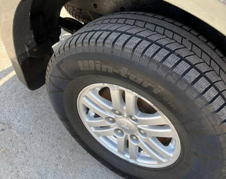 Черный Мицубиси Л 200, объемом двигателя 2.5 л и пробегом 221 тыс. км за 12800 $, фото 5 на Automoto.ua