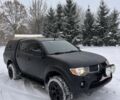 Черный Мицубиси Л 200, объемом двигателя 2.5 л и пробегом 200 тыс. км за 7500 $, фото 1 на Automoto.ua