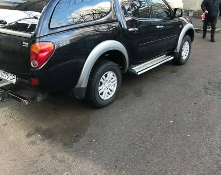 Черный Мицубиси Л 200, объемом двигателя 2.5 л и пробегом 270 тыс. км за 13000 $, фото 12 на Automoto.ua