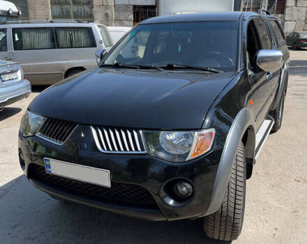 Черный Мицубиси Л 200, объемом двигателя 2.5 л и пробегом 221 тыс. км за 12800 $, фото 14 на Automoto.ua