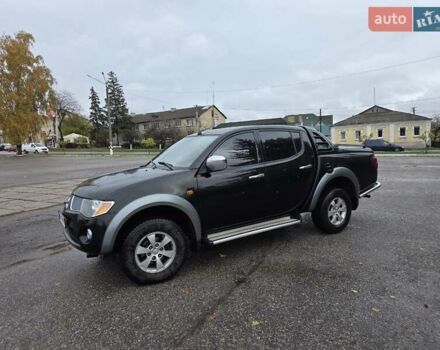 Чорний Міцубісі Л 200, об'ємом двигуна 2.48 л та пробігом 302 тис. км за 12500 $, фото 1 на Automoto.ua