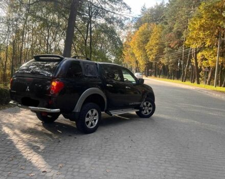 Черный Мицубиси Л 200, объемом двигателя 2.5 л и пробегом 180 тыс. км за 7200 $, фото 1 на Automoto.ua