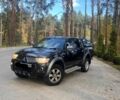Черный Мицубиси Л 200, объемом двигателя 2.5 л и пробегом 180 тыс. км за 7200 $, фото 1 на Automoto.ua