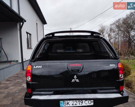 Чорний Міцубісі Л 200, об'ємом двигуна 2.48 л та пробігом 219 тис. км за 10500 $, фото 24 на Automoto.ua