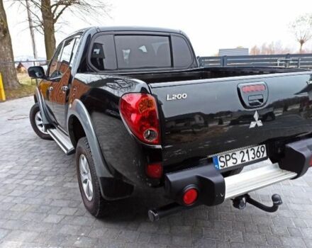Черный Мицубиси Л 200, объемом двигателя 2.5 л и пробегом 270 тыс. км за 3424 $, фото 6 на Automoto.ua