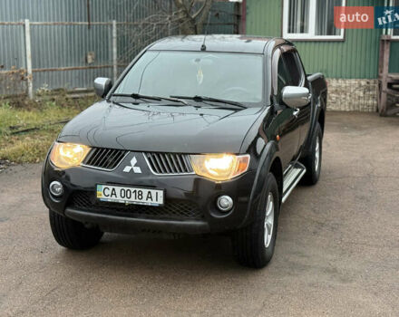 Черный Мицубиси Л 200, объемом двигателя 2.5 л и пробегом 261 тыс. км за 12300 $, фото 7 на Automoto.ua