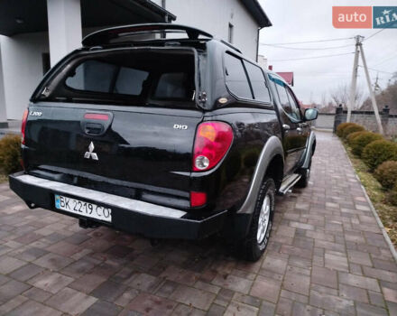 Чорний Міцубісі Л 200, об'ємом двигуна 2.48 л та пробігом 219 тис. км за 10500 $, фото 25 на Automoto.ua