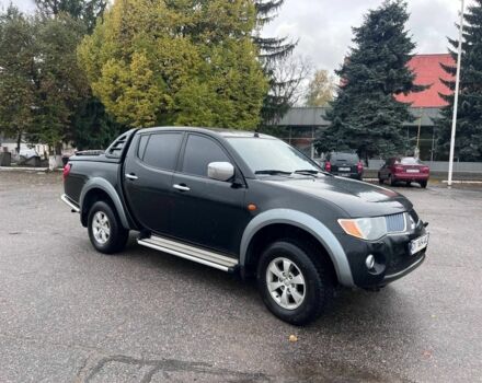 Чорний Міцубісі Л 200, об'ємом двигуна 2.5 л та пробігом 302 тис. км за 12500 $, фото 1 на Automoto.ua