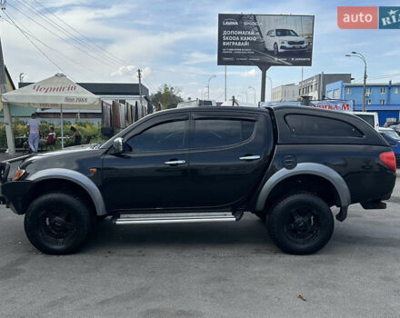 Черный Мицубиси Л 200, объемом двигателя 2.48 л и пробегом 210 тыс. км за 16500 $, фото 6 на Automoto.ua