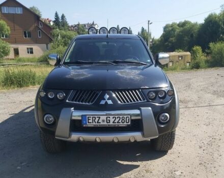 Чорний Міцубісі Л 200, об'ємом двигуна 2.5 л та пробігом 200 тис. км за 8756 $, фото 1 на Automoto.ua