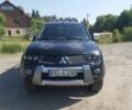 Чорний Міцубісі Л 200, об'ємом двигуна 2.5 л та пробігом 200 тис. км за 8756 $, фото 1 на Automoto.ua