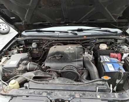 Черный Мицубиси Л 200, объемом двигателя 2.5 л и пробегом 270 тыс. км за 3424 $, фото 7 на Automoto.ua