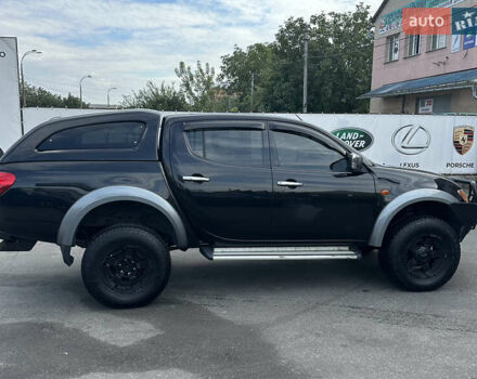 Черный Мицубиси Л 200, объемом двигателя 2.48 л и пробегом 210 тыс. км за 16500 $, фото 3 на Automoto.ua