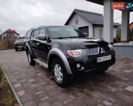 Чорний Міцубісі Л 200, об'ємом двигуна 2.48 л та пробігом 219 тис. км за 10500 $, фото 1 на Automoto.ua