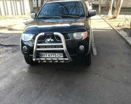Черный Мицубиси Л 200, объемом двигателя 2.5 л и пробегом 270 тыс. км за 13000 $, фото 1 на Automoto.ua