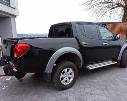 Черный Мицубиси Л 200, объемом двигателя 2.5 л и пробегом 270 тыс. км за 3424 $, фото 2 на Automoto.ua