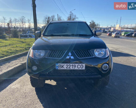 Чорний Міцубісі Л 200, об'ємом двигуна 2.48 л та пробігом 219 тис. км за 10500 $, фото 11 на Automoto.ua