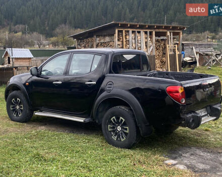 Черный Мицубиси Л 200, объемом двигателя 0 л и пробегом 400 тыс. км за 8500 $, фото 1 на Automoto.ua