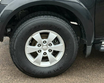 Черный Мицубиси Л 200, объемом двигателя 2.5 л и пробегом 261 тыс. км за 12300 $, фото 14 на Automoto.ua