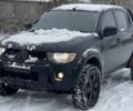 Черный Мицубиси Л 200, объемом двигателя 0 л и пробегом 130 тыс. км за 6700 $, фото 1 на Automoto.ua