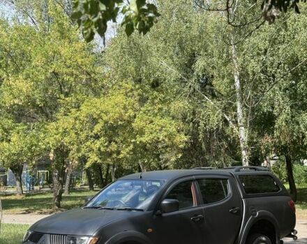 Чорний Міцубісі Л 200, об'ємом двигуна 2.5 л та пробігом 123 тис. км за 5750 $, фото 1 на Automoto.ua
