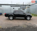 Черный Мицубиси Л 200, объемом двигателя 2.5 л и пробегом 261 тыс. км за 12300 $, фото 11 на Automoto.ua