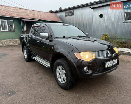 Черный Мицубиси Л 200, объемом двигателя 2.5 л и пробегом 261 тыс. км за 12300 $, фото 8 на Automoto.ua