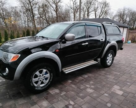 Чорний Міцубісі Л 200, об'ємом двигуна 2.5 л та пробігом 220 тис. км за 10500 $, фото 1 на Automoto.ua