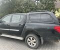 Черный Мицубиси Л 200, объемом двигателя 0 л и пробегом 150 тыс. км за 7200 $, фото 1 на Automoto.ua