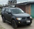 Черный Мицубиси Л 200, объемом двигателя 2.5 л и пробегом 200 тыс. км за 6300 $, фото 1 на Automoto.ua