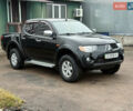 Черный Мицубиси Л 200, объемом двигателя 2.5 л и пробегом 261 тыс. км за 12300 $, фото 3 на Automoto.ua